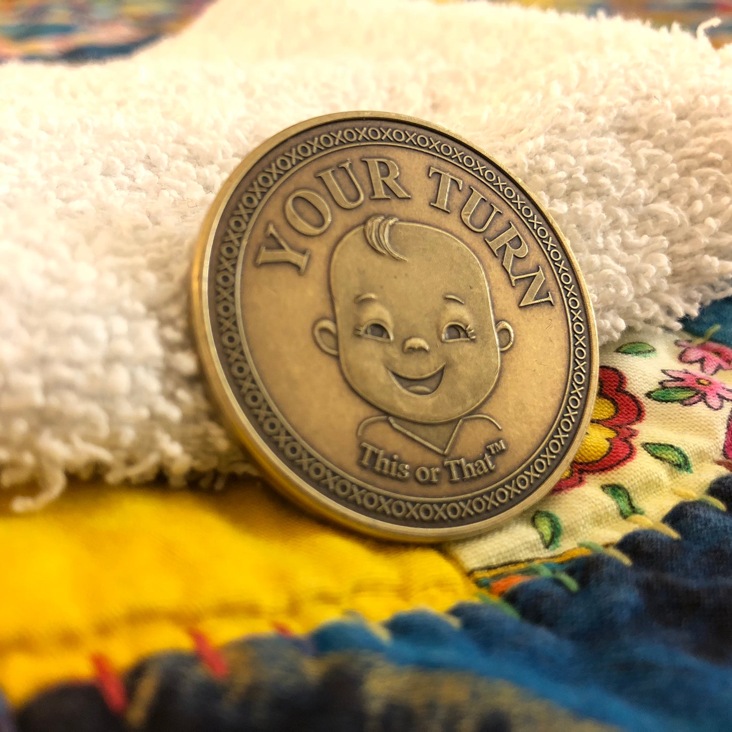 This or That Diaper Changing Coin in bed