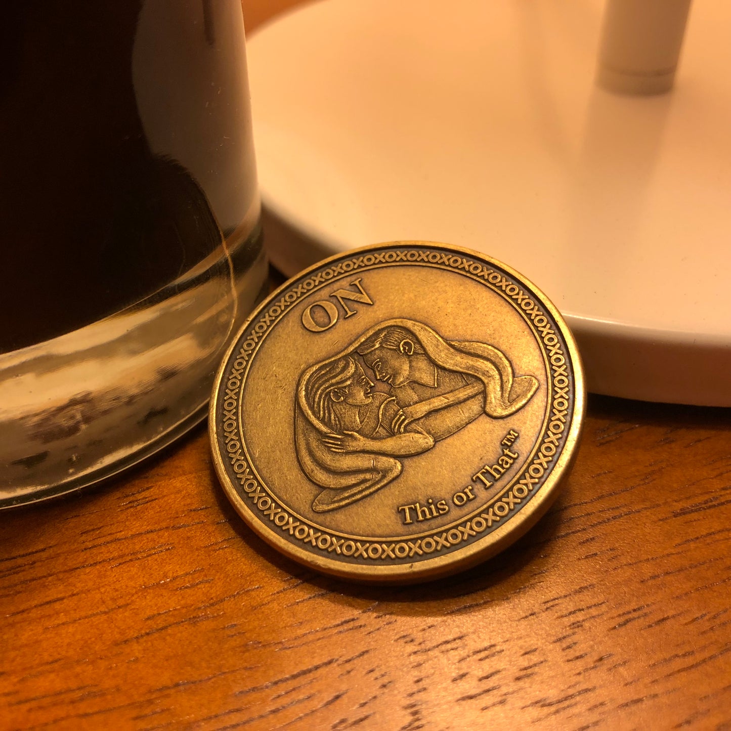 This or That Couples Therapy Coin in bedside table